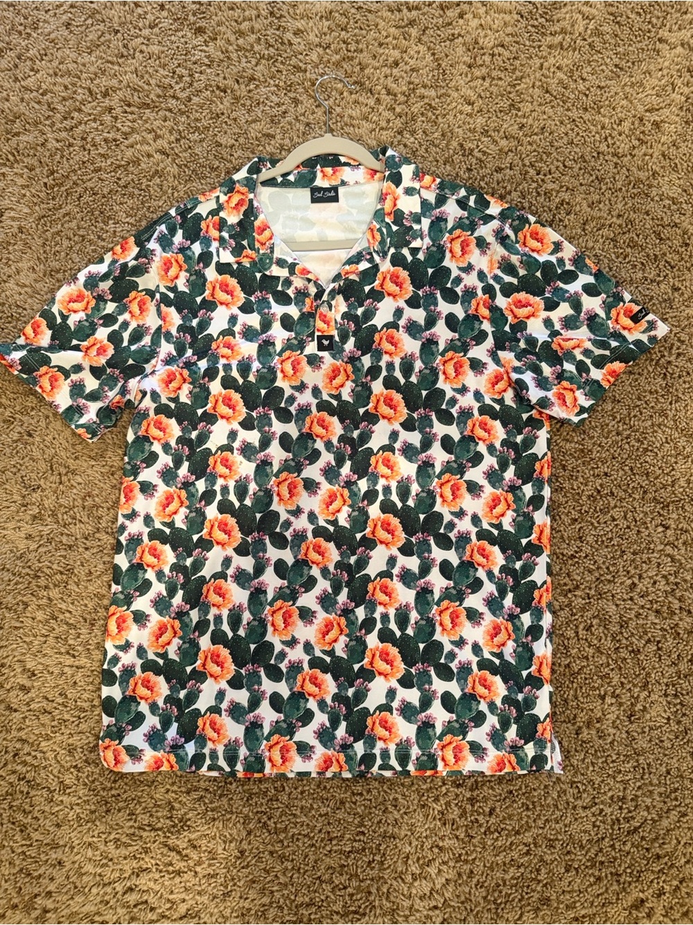 Bad Birdie Men’s Floral Polo - White with Orange & Green